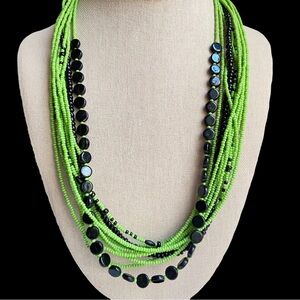 Black and green glass seed bead multi strand necklace with silvertone end caps